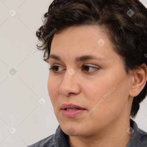 Neutral white young-adult female with medium  brown hair and brown eyes