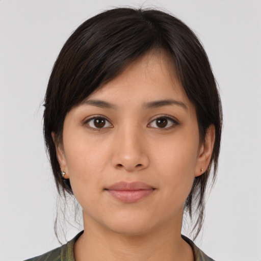 Joyful asian young-adult female with medium  brown hair and brown eyes
