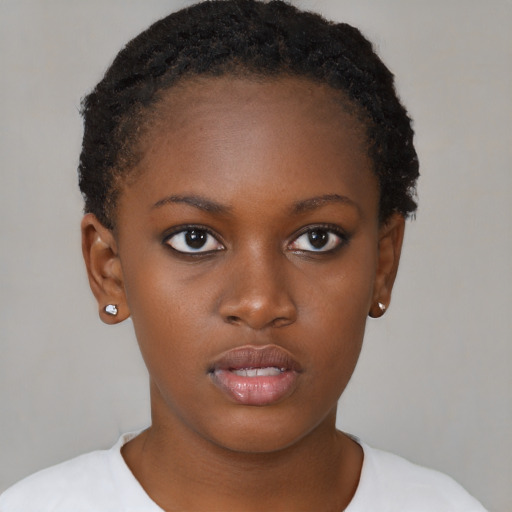 Neutral black young-adult female with short  brown hair and brown eyes