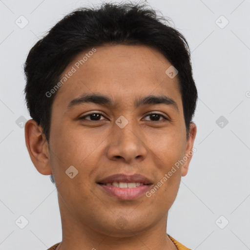 Joyful latino young-adult male with short  brown hair and brown eyes