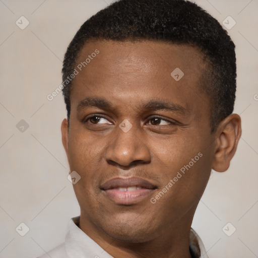 Joyful latino young-adult male with short  brown hair and brown eyes