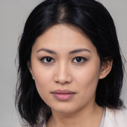 Neutral asian young-adult female with medium  black hair and brown eyes