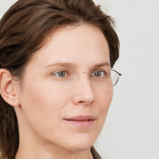 Neutral white young-adult female with long  brown hair and grey eyes