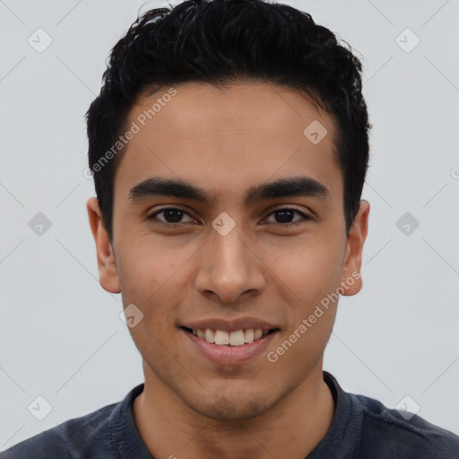 Joyful latino young-adult male with short  black hair and brown eyes