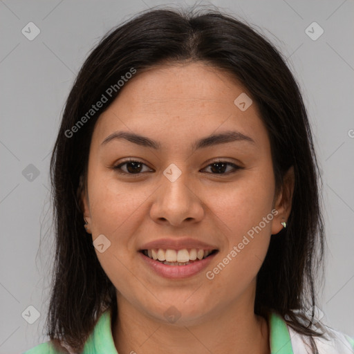 Joyful latino young-adult female with medium  brown hair and brown eyes