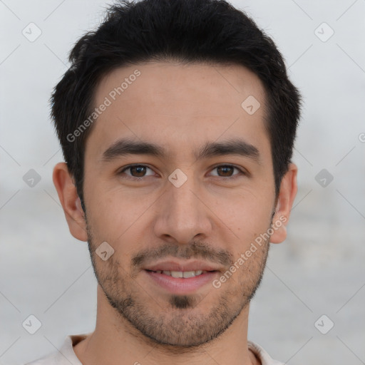 Joyful asian young-adult male with short  black hair and brown eyes