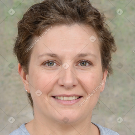 Joyful white adult female with short  brown hair and grey eyes