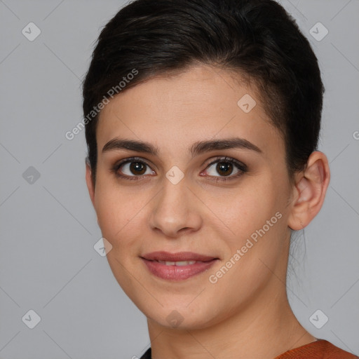 Joyful white young-adult female with short  brown hair and brown eyes