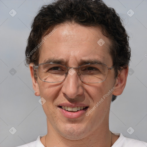 Joyful white middle-aged male with short  brown hair and brown eyes