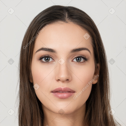 Neutral white young-adult female with long  brown hair and brown eyes