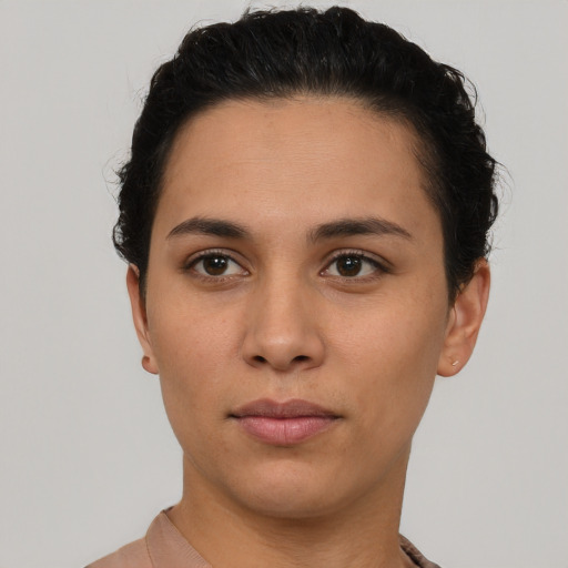 Neutral latino young-adult female with short  brown hair and brown eyes