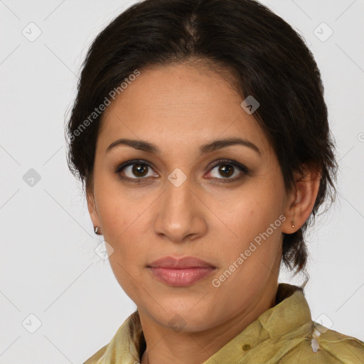 Joyful latino young-adult female with medium  brown hair and brown eyes