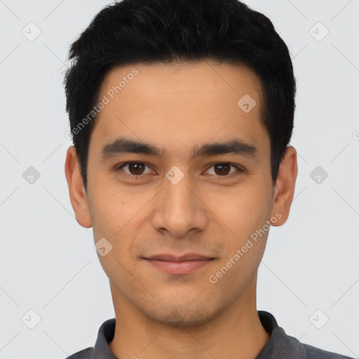 Joyful white young-adult male with short  black hair and brown eyes