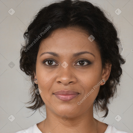 Joyful black young-adult female with medium  brown hair and brown eyes