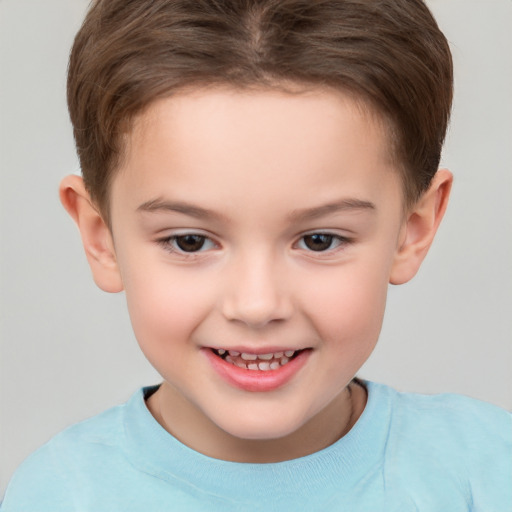 Joyful white child female with short  brown hair and brown eyes