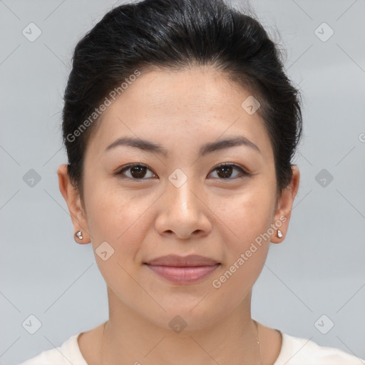 Joyful asian young-adult female with short  brown hair and brown eyes