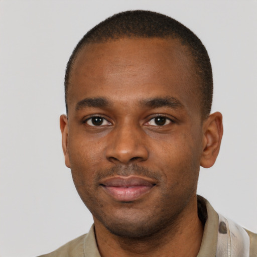 Neutral black young-adult male with short  brown hair and brown eyes