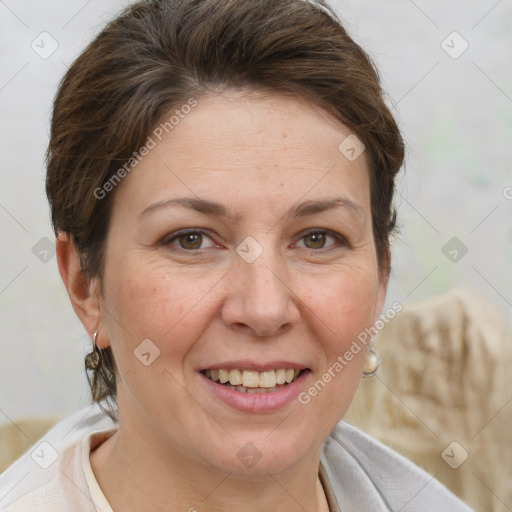 Joyful white adult female with short  brown hair and brown eyes