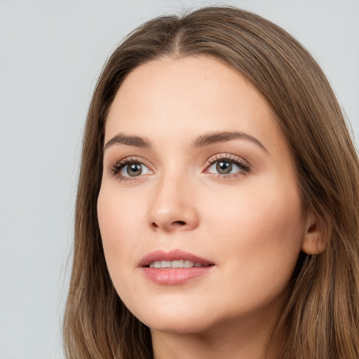 Neutral white young-adult female with long  brown hair and brown eyes