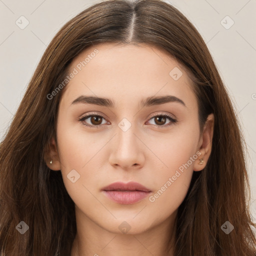 Neutral white young-adult female with long  brown hair and brown eyes