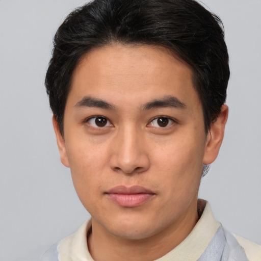 Neutral latino young-adult male with short  brown hair and brown eyes
