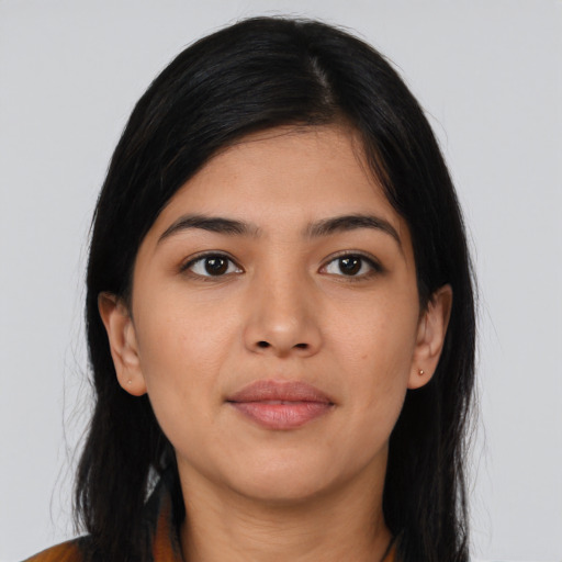 Neutral latino young-adult female with long  black hair and brown eyes