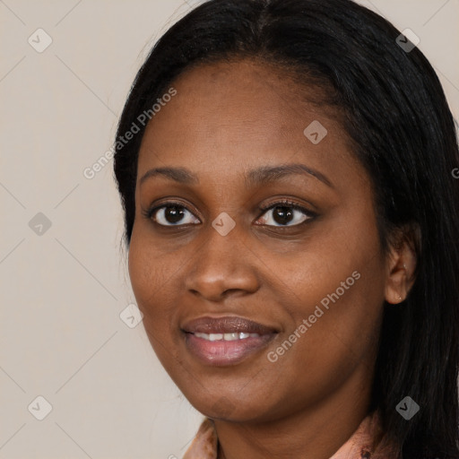 Joyful black young-adult female with medium  black hair and brown eyes