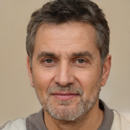 Joyful white middle-aged male with short  brown hair and brown eyes