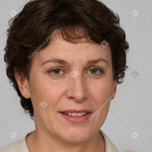 Joyful white adult female with short  brown hair and brown eyes