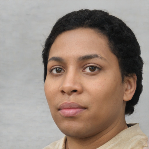 Neutral latino young-adult female with short  black hair and brown eyes