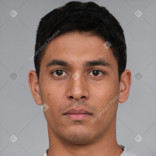 Neutral latino young-adult male with short  black hair and brown eyes