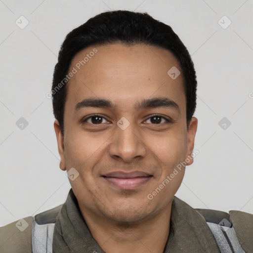 Joyful latino young-adult male with short  black hair and brown eyes