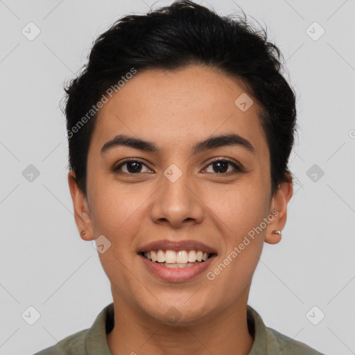 Joyful latino young-adult female with short  brown hair and brown eyes