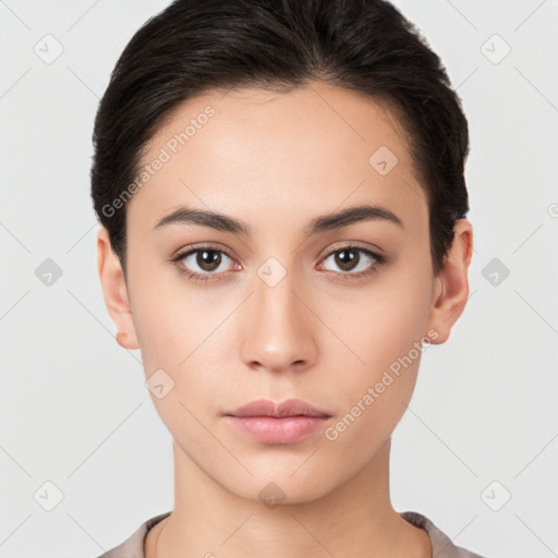 Neutral white young-adult female with short  brown hair and brown eyes