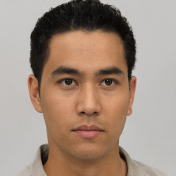 Neutral asian young-adult male with short  black hair and brown eyes