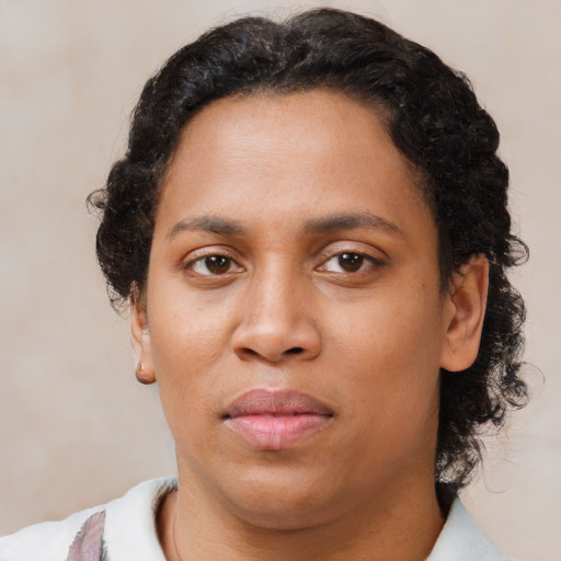 Neutral black young-adult female with short  brown hair and brown eyes