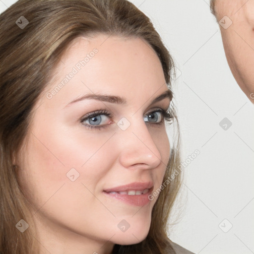 Joyful white young-adult female with medium  brown hair and grey eyes