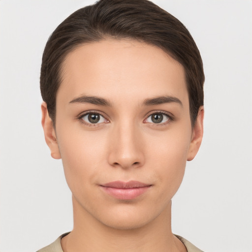 Neutral white young-adult female with short  brown hair and brown eyes