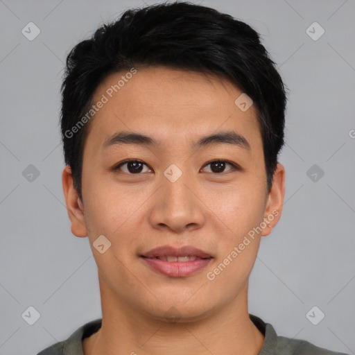 Joyful asian young-adult male with short  black hair and brown eyes