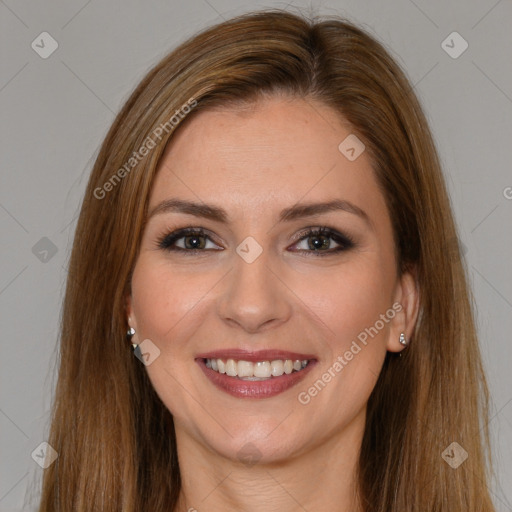 Joyful white young-adult female with long  brown hair and brown eyes