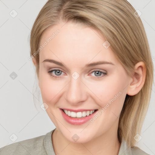 Joyful white young-adult female with medium  brown hair and blue eyes