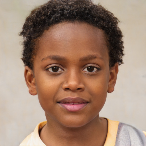 Joyful black child female with short  brown hair and brown eyes