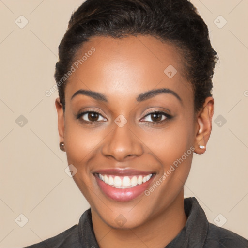 Joyful latino young-adult female with short  black hair and brown eyes