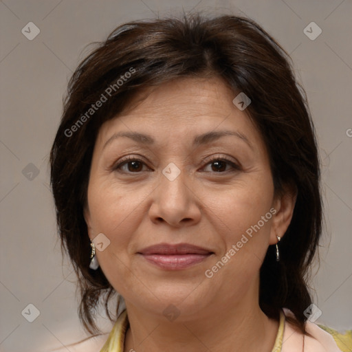 Joyful white adult female with medium  brown hair and brown eyes