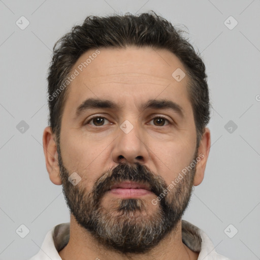 Neutral white adult male with short  black hair and brown eyes