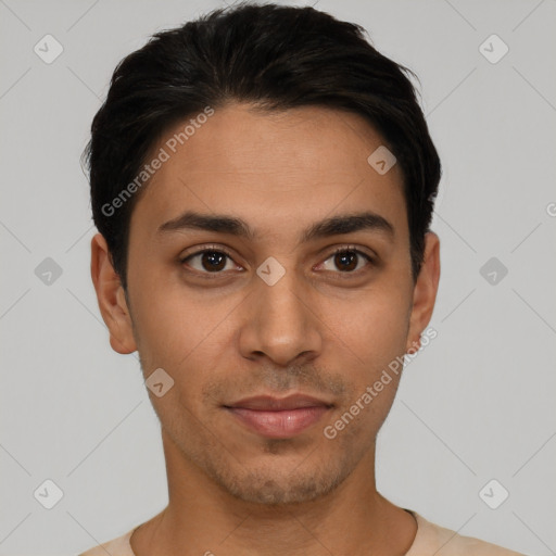 Joyful latino young-adult male with short  black hair and brown eyes