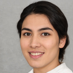 Joyful white young-adult female with medium  brown hair and brown eyes