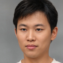 Neutral asian young-adult male with short  brown hair and brown eyes