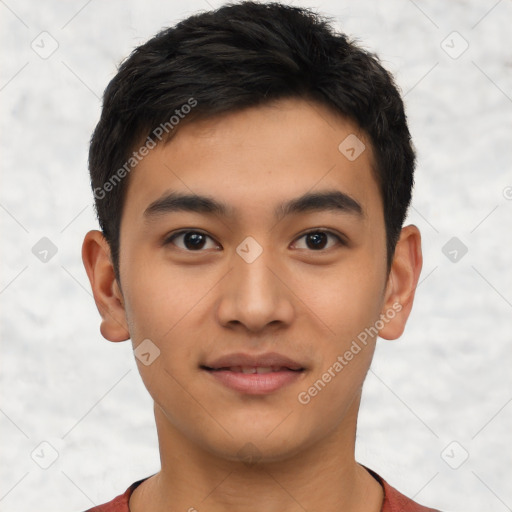 Joyful latino young-adult male with short  black hair and brown eyes