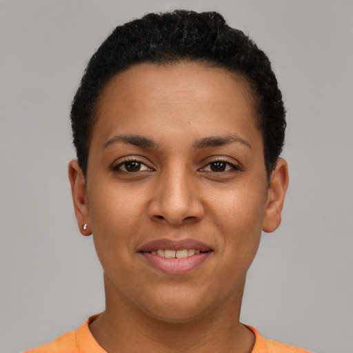 Joyful latino young-adult female with short  brown hair and brown eyes